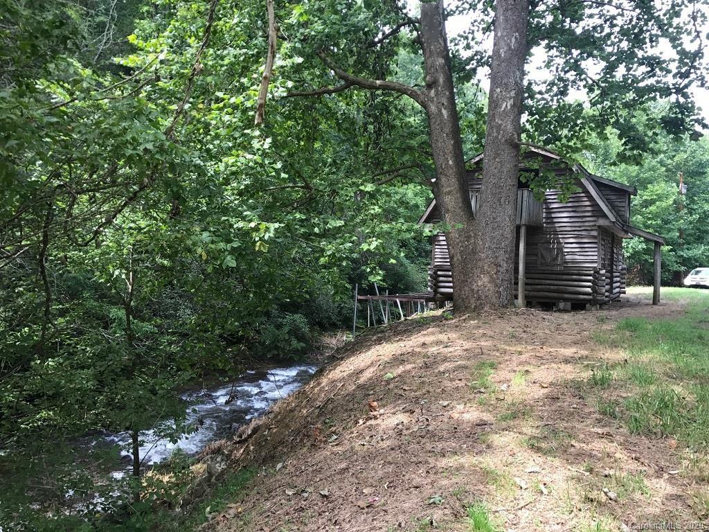0 Lower Alarka Road Bryson City, NC 28713 - Photo 1 of 14 a backyard of a house with lots of green space