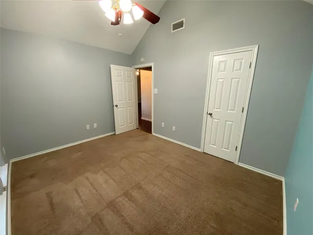 an empty room with a bathroom