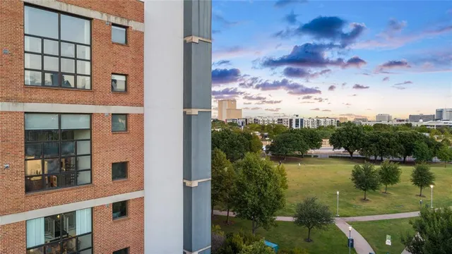 front view of a building with a lake view