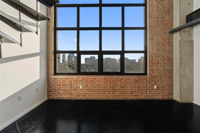 a view of an empty room and window