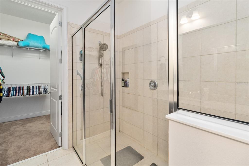 2557 Yellow Brick Road St. Cloud, FL 34772 - Photo 22 of 41 a bathroom with a shower