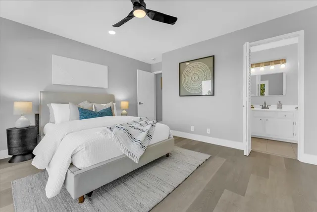 a bedroom with a bed and a view