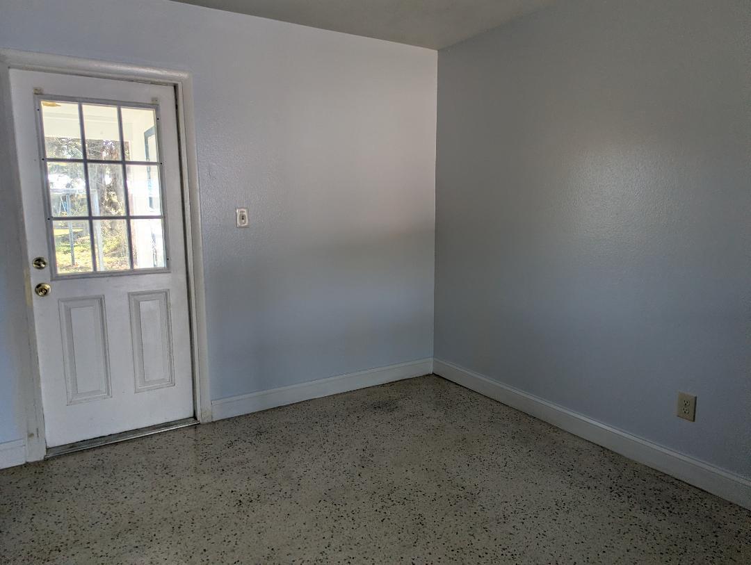 2736 Seneca Avenue Fort Pierce, FL 34946 - Photo 12 of 16 an empty room with a window