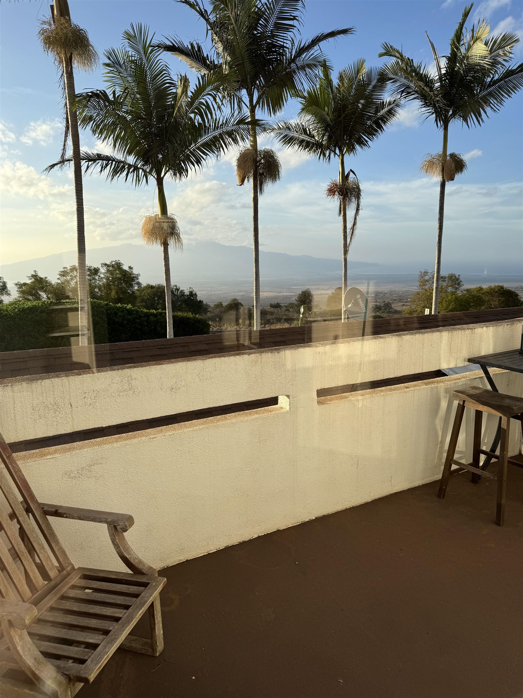 40 Kalihi Place Kula, HI 96790 - Photo 1 of 15 a view of a swimming pool with a table and chairs