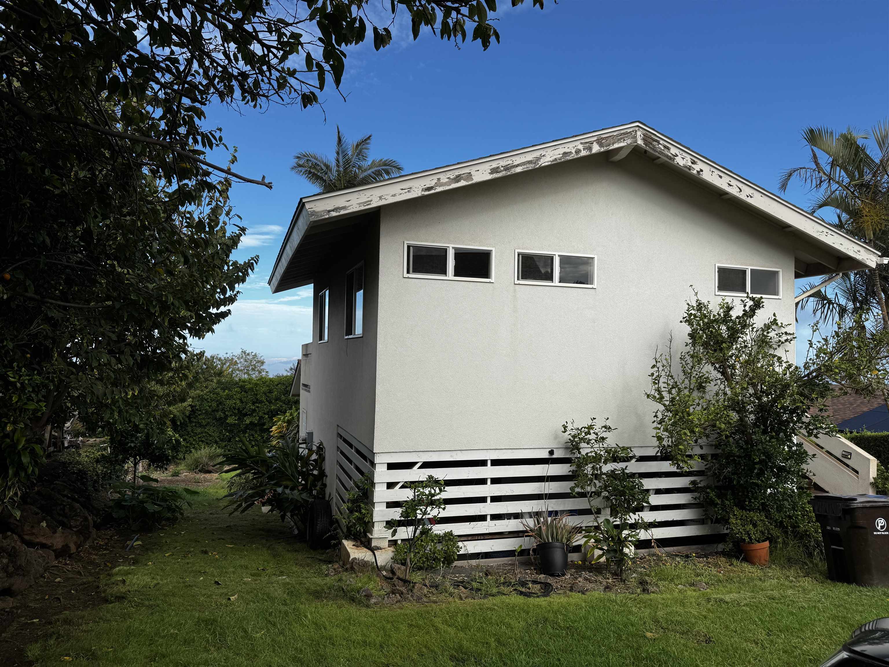 40 Kalihi Place Kula, HI 96790 - Photo 9 of 15 a front view of a house with a garden