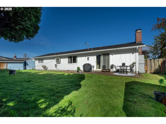 a view of a backyard with garden