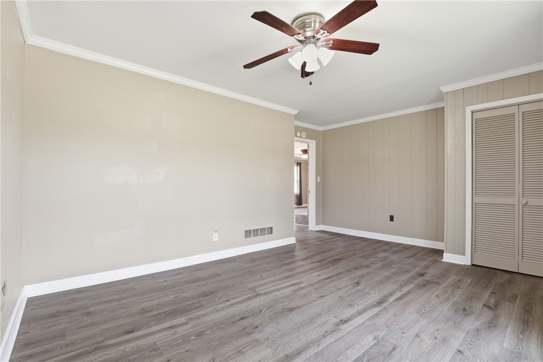 4304 Old Buncombe Road Greenville, SC 29617 - Photo 14 of 50 Bright and open room features durable flooring, offering versatile living space.