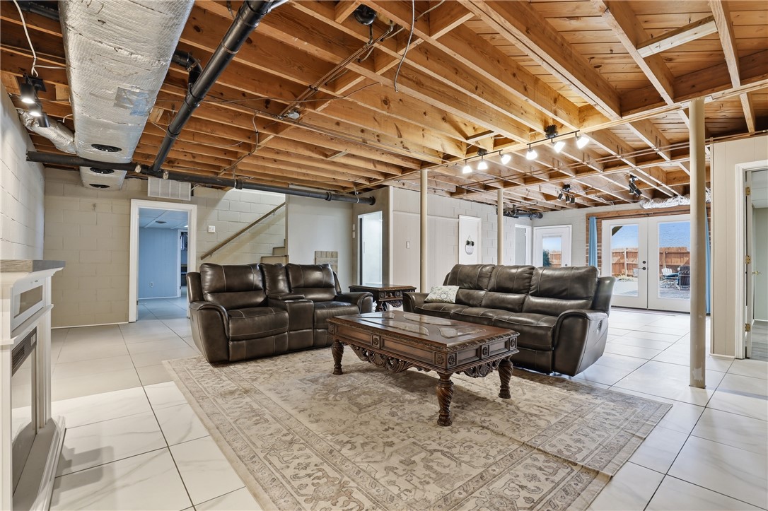4304 Old Buncombe Road Greenville, SC 29617 - Photo 30 of 50 This versatile basement space offers comfortable living with direct access to outdoor recreation.