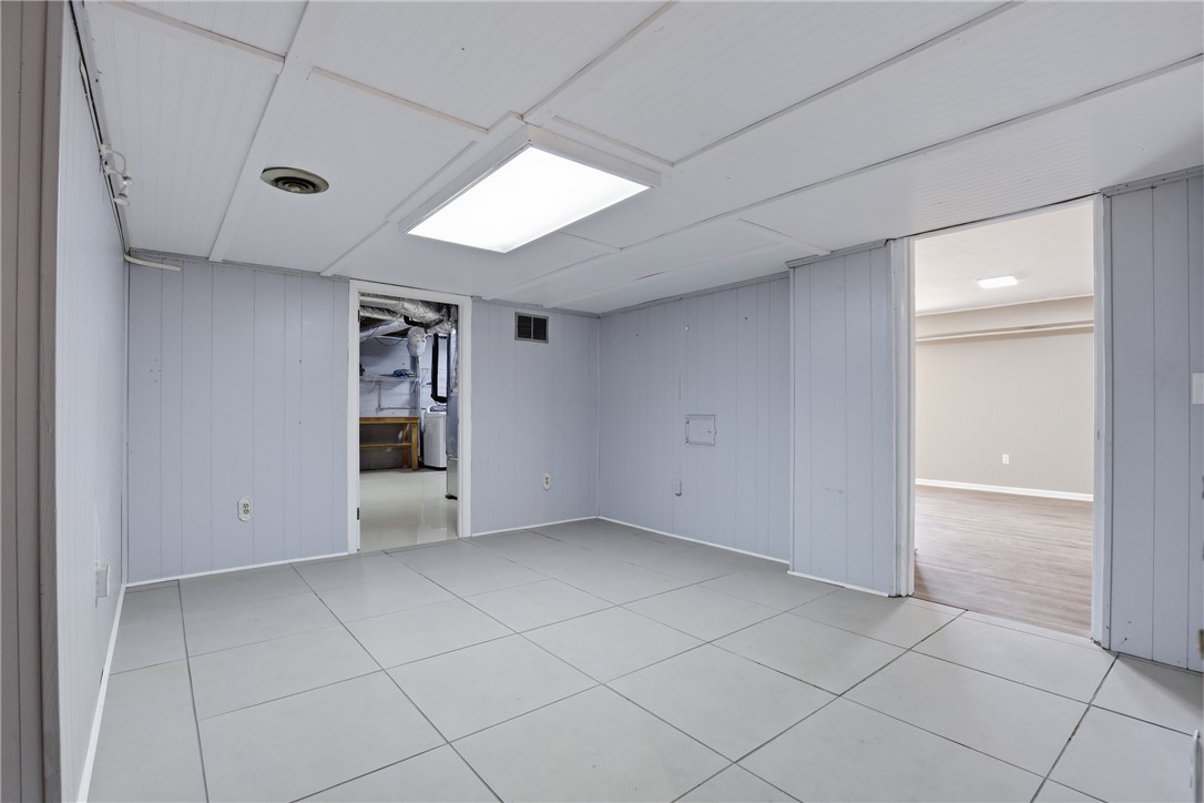 4304 Old Buncombe Road Greenville, SC 29617 - Photo 36 of 50 This spacious area offers versatile possibilities with ample room for various uses.