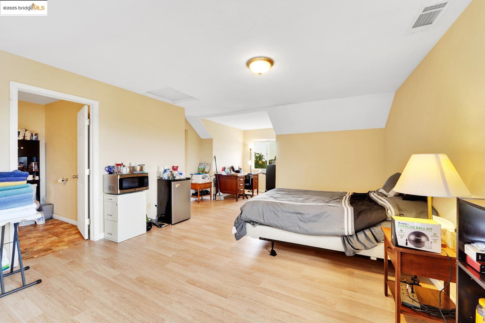 1259 Fulton Avenue Vallejo, CA 94591 - Photo 25 of 28 a living room with furniture and a flat screen tv