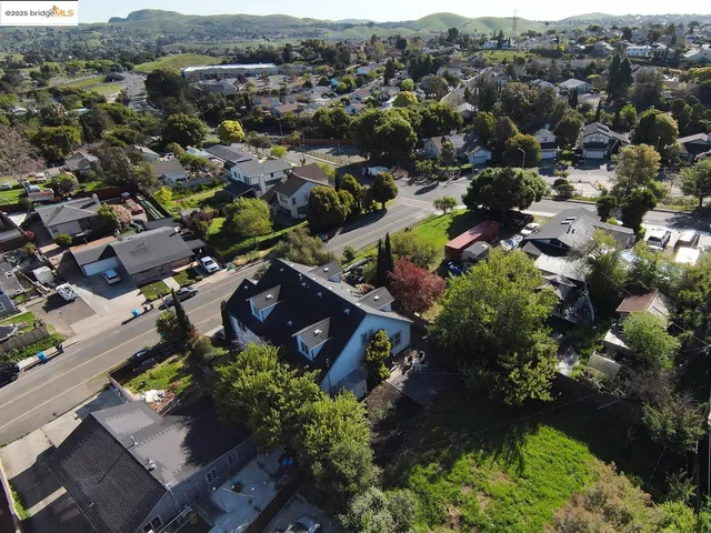 an aerial view of a city with lots of residential buildings