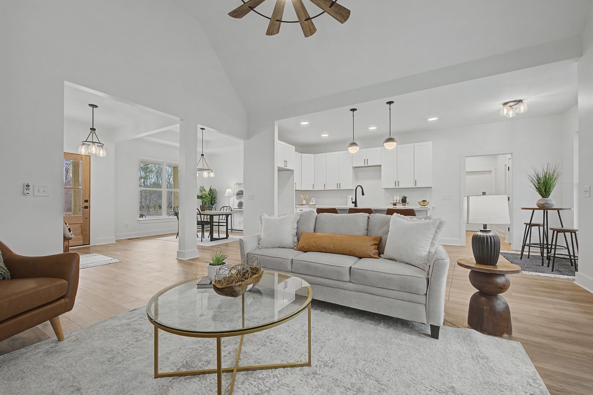 1171 Old Charlotte Road White Bluff, TN 37187 - Photo 11 of 29 a living room with furniture or kitchen view and a chandelier