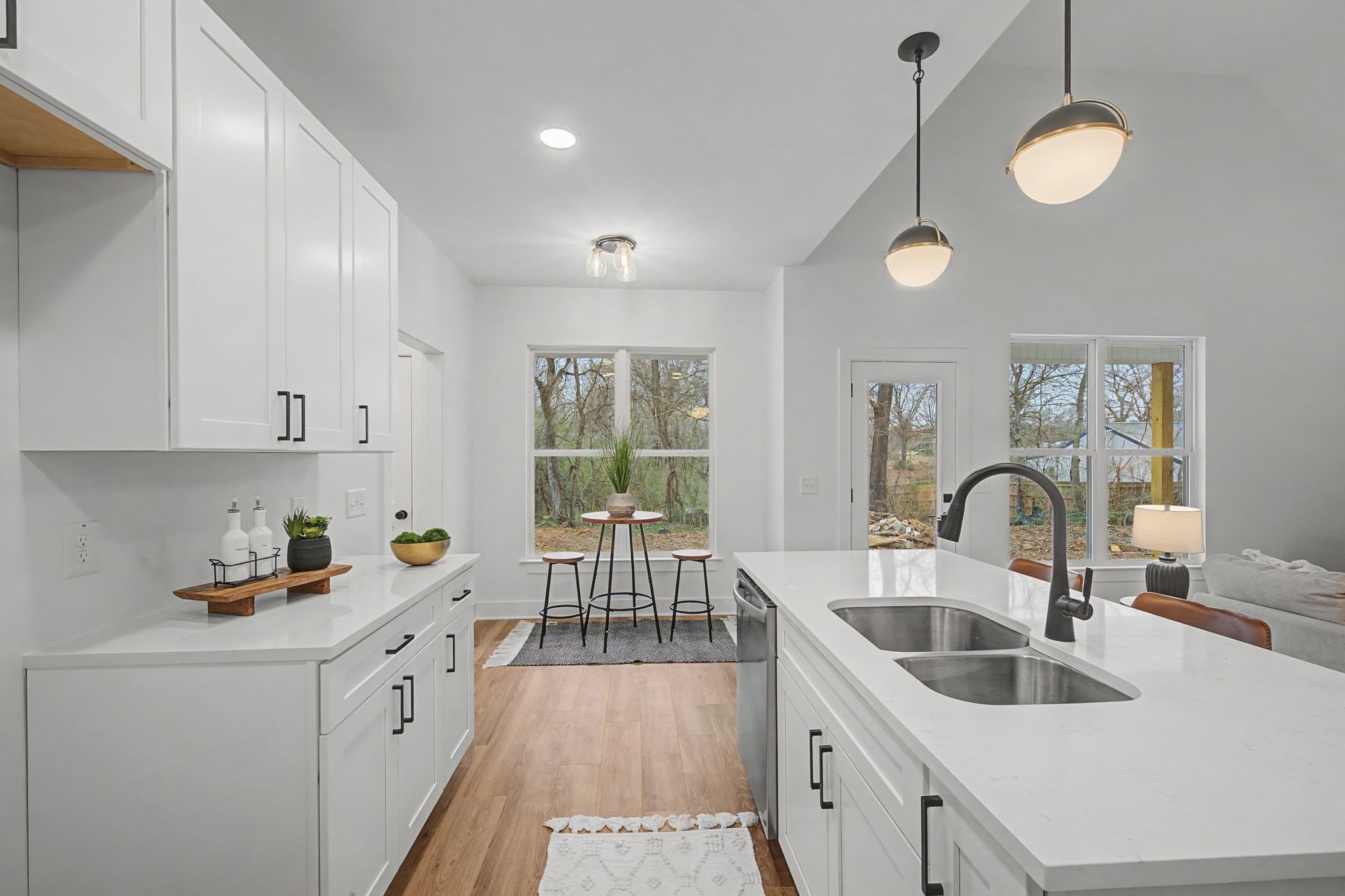 1171 Old Charlotte Road White Bluff, TN 37187 - Photo 16 of 29 a kitchen with sink a refrigerator and cabinets