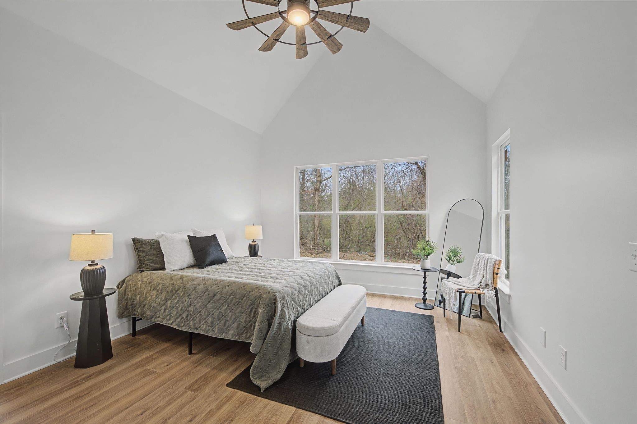 1171 Old Charlotte Road White Bluff, TN 37187 - Photo 17 of 29 a bedroom with a bed and a large window