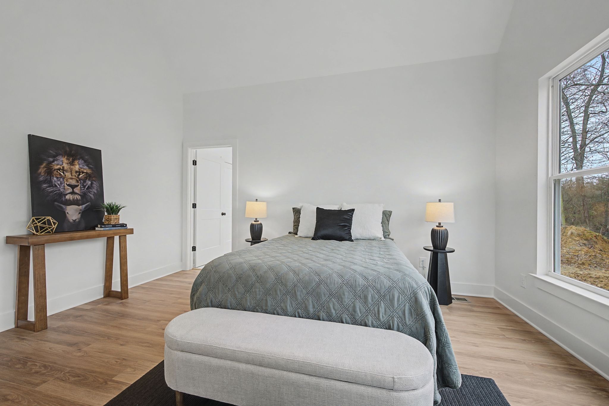 1171 Old Charlotte Road White Bluff, TN 37187 - Photo 18 of 29 a bedroom with a bed and wooden floor