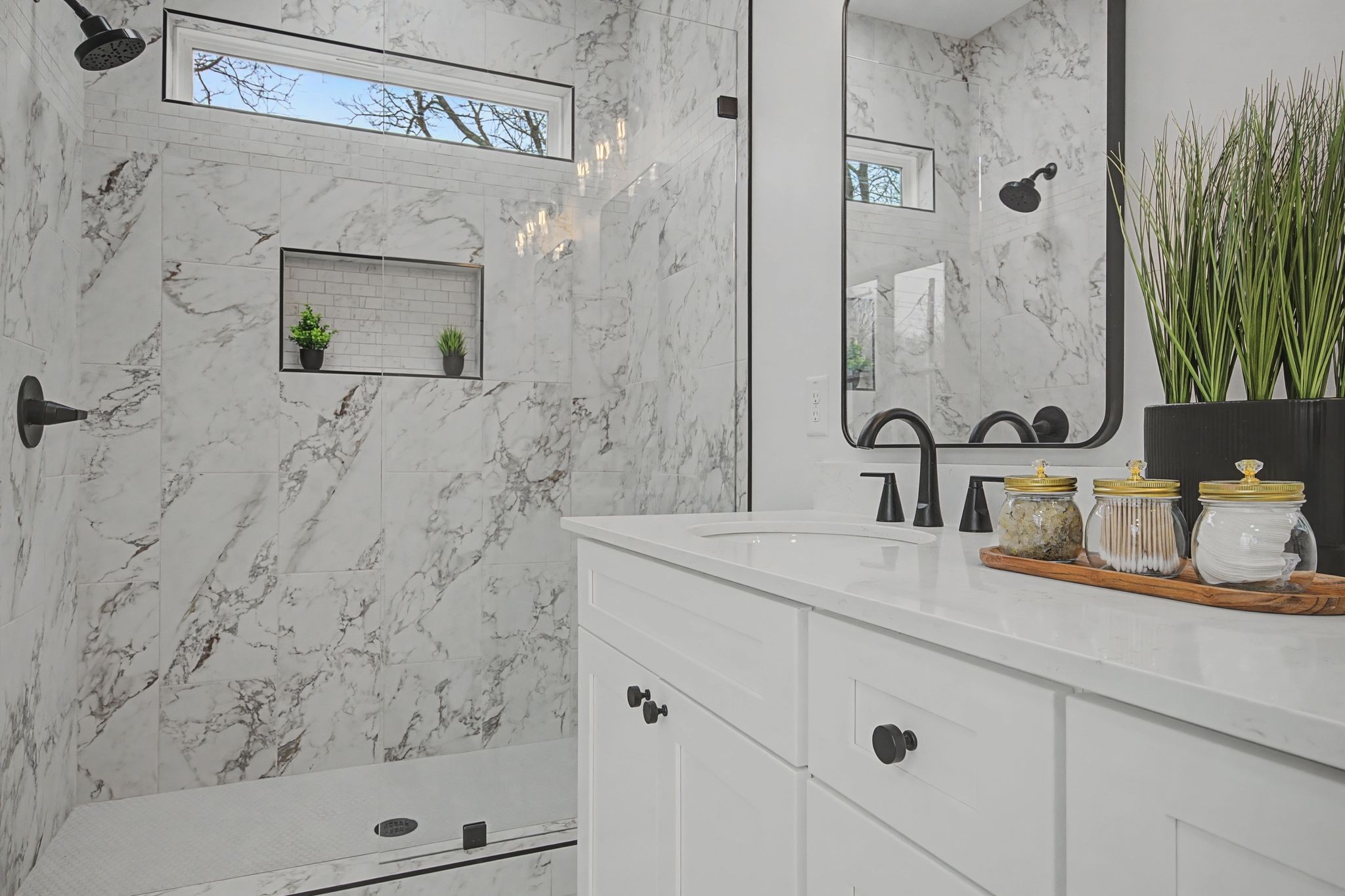 1171 Old Charlotte Road White Bluff, TN 37187 - Photo 21 of 29 a bathroom with a sink and a mirror