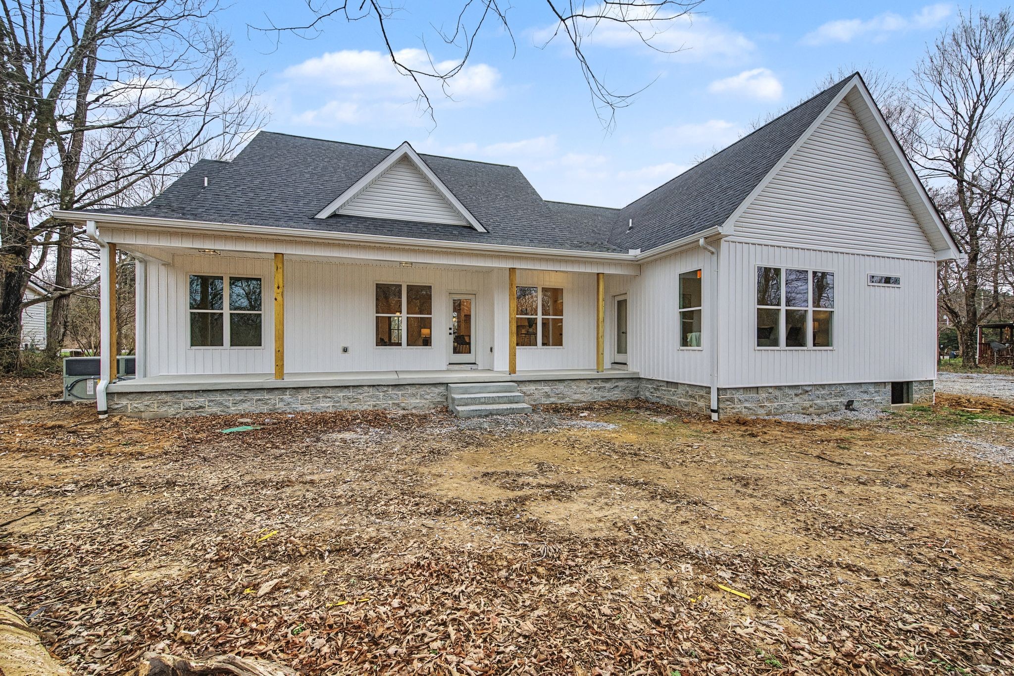1171 Old Charlotte Road White Bluff, TN 37187 - Photo 29 of 29 a front view of a house with a yard