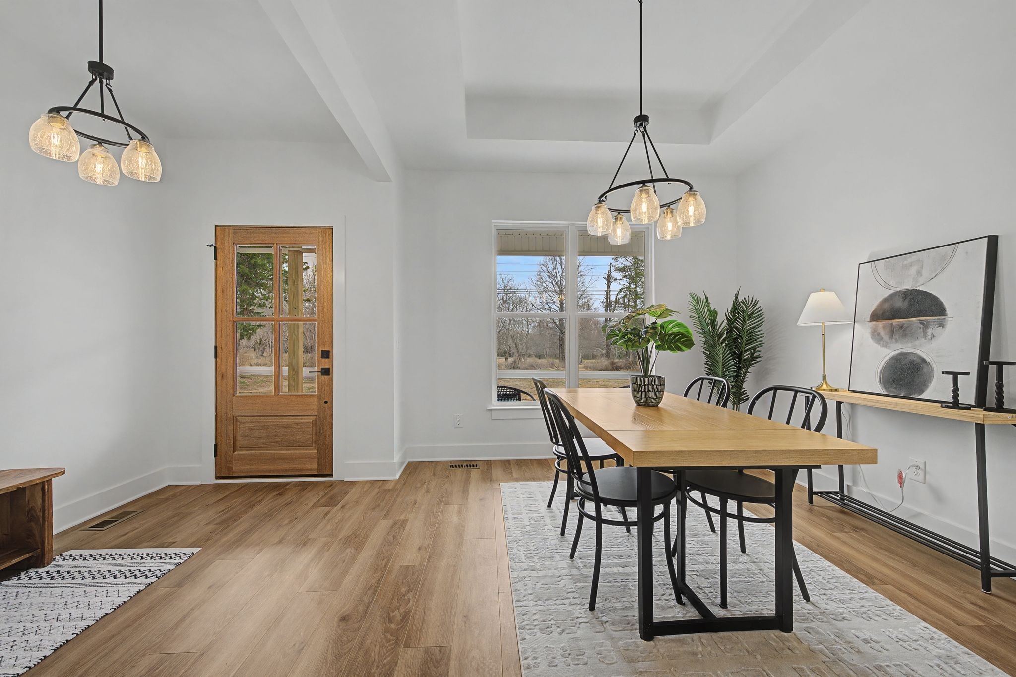 1171 Old Charlotte Road White Bluff, TN 37187 - Photo 6 of 29 a view of a dining room with furniture window and wooden floor