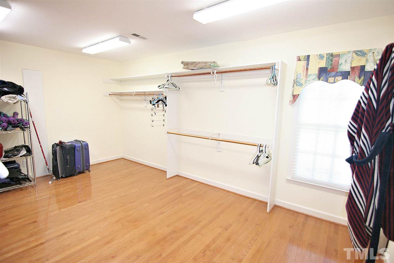 218 Queensferry Road Cary, NC 27511 - Photo 15 of 25 a bathroom with a bathtub and a shower