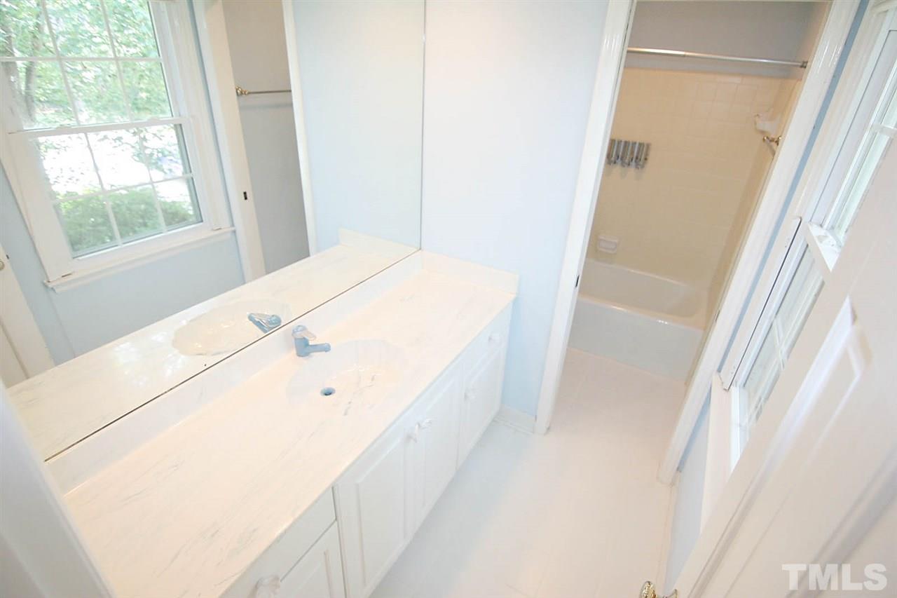 218 Queensferry Road Cary, NC 27511 - Photo 23 of 25 a view of hallway with windows