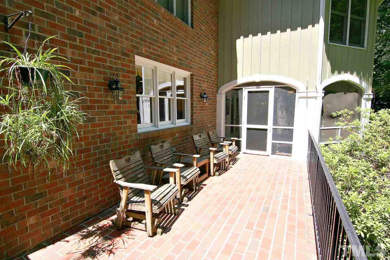218 Queensferry Road Cary, NC 27511 - Photo 4 of 25 a view of a lounge chair in the balcony
