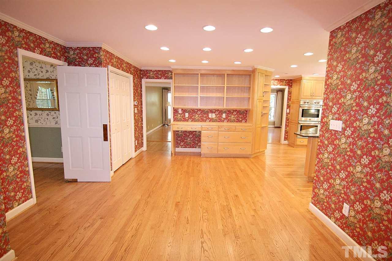 218 Queensferry Road Cary, NC 27511 - Photo 9 of 25 a view of a living room with wooden floor