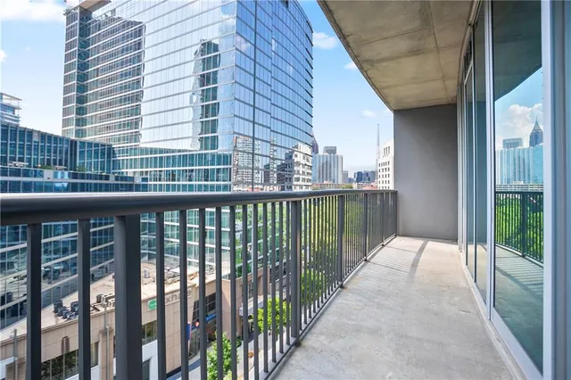 a view of a building with a street