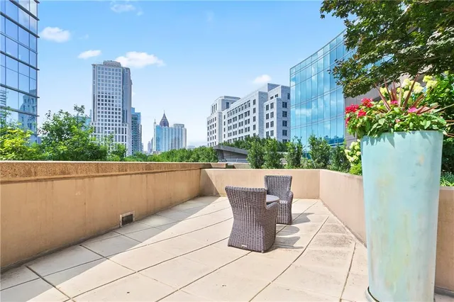 a view of a patio with furniture and outdoor