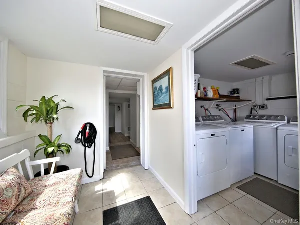 a view of kitchen with cabinets