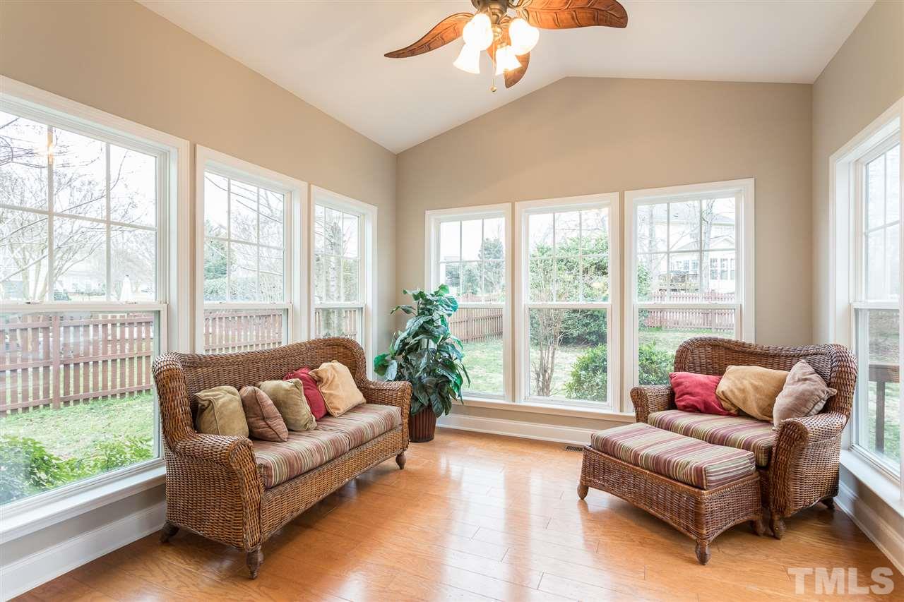 107 Locke Woods Road Raleigh, NC 27603 - Photo 14 of 30 a living room with furniture and a large window