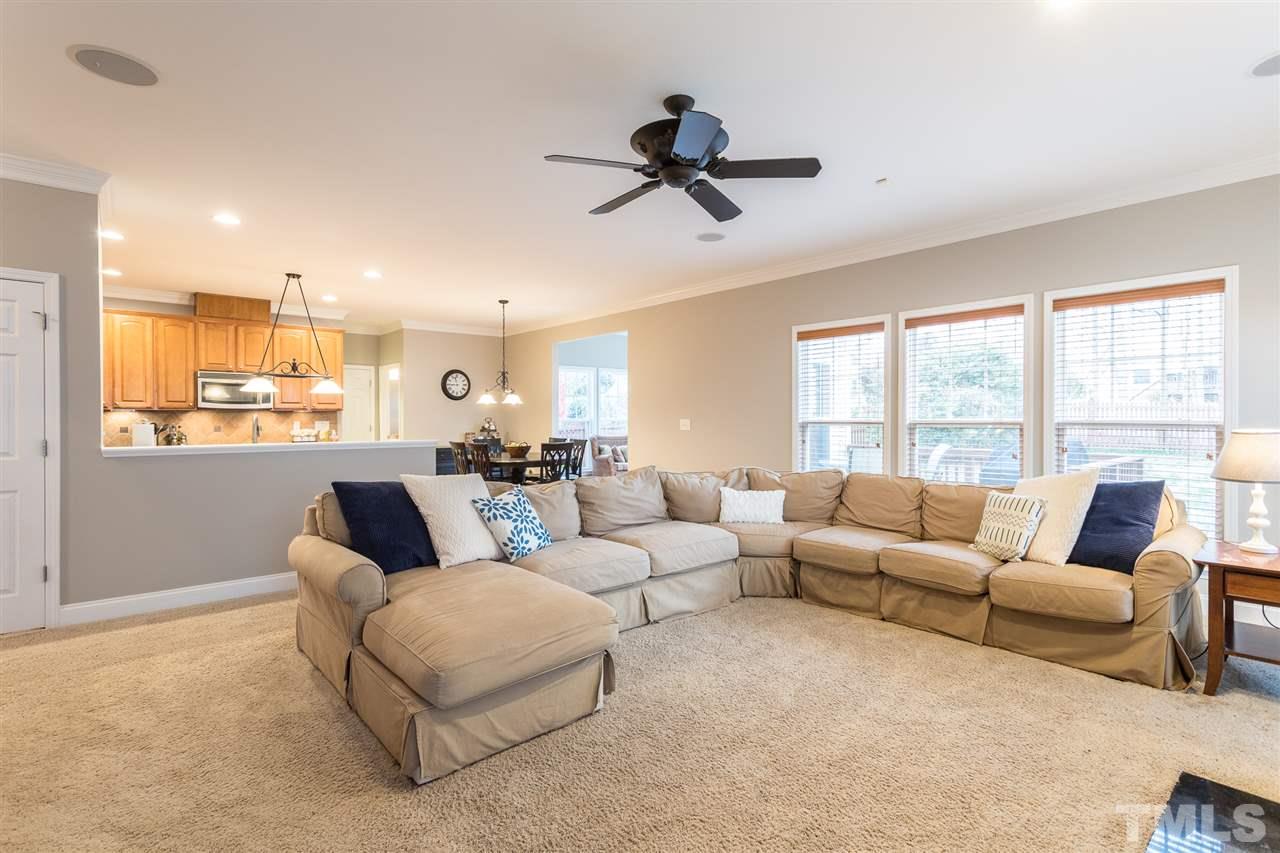 107 Locke Woods Road Raleigh, NC 27603 - Photo 6 of 30 a living room with furniture and a large window