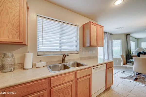 a kitchen with a stove and a refrigerator