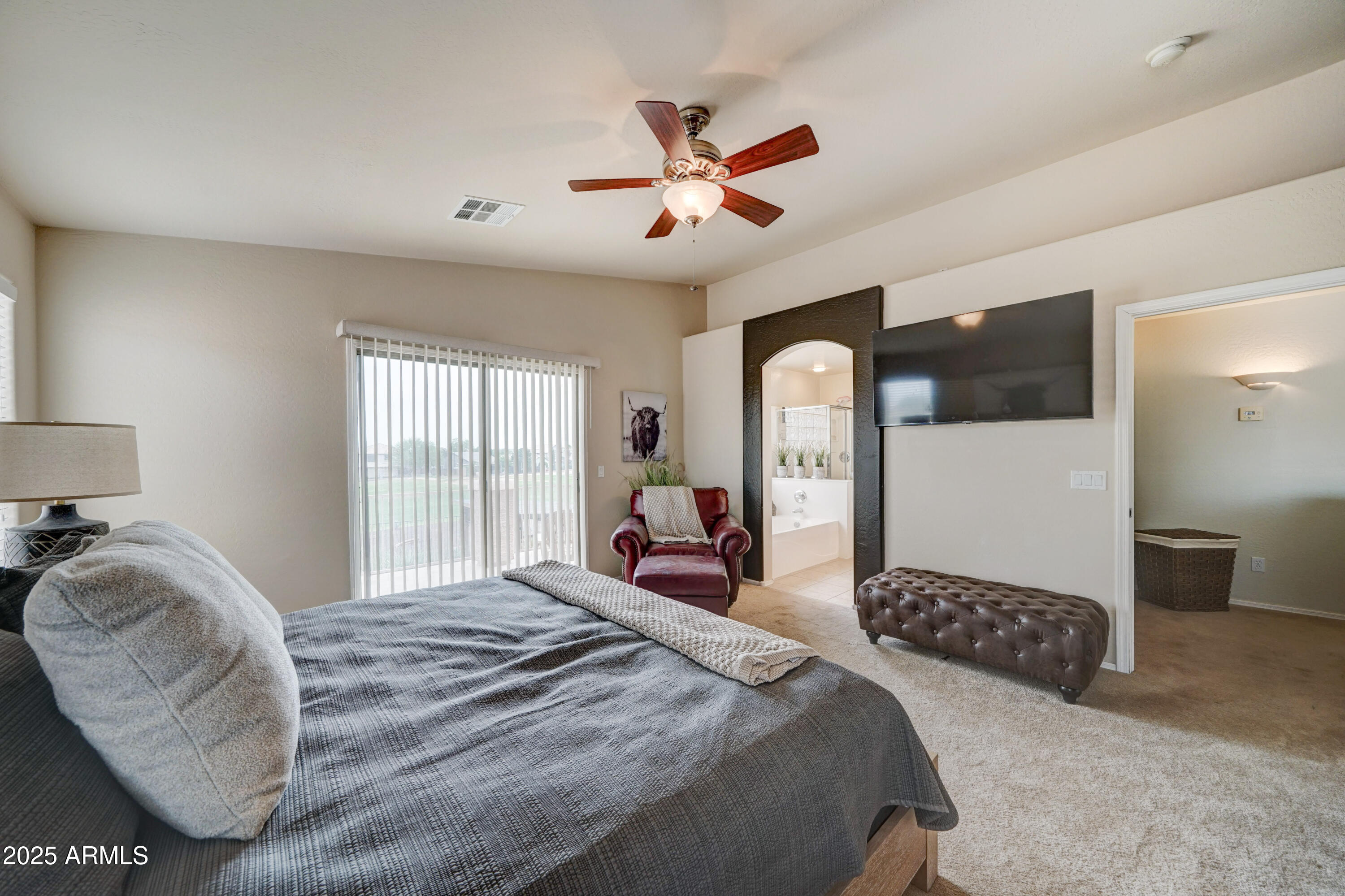 Undisclosed Address San Tan Valley, AZ 85143 - Photo 25 of 57 a bedroom with double bed and a large window