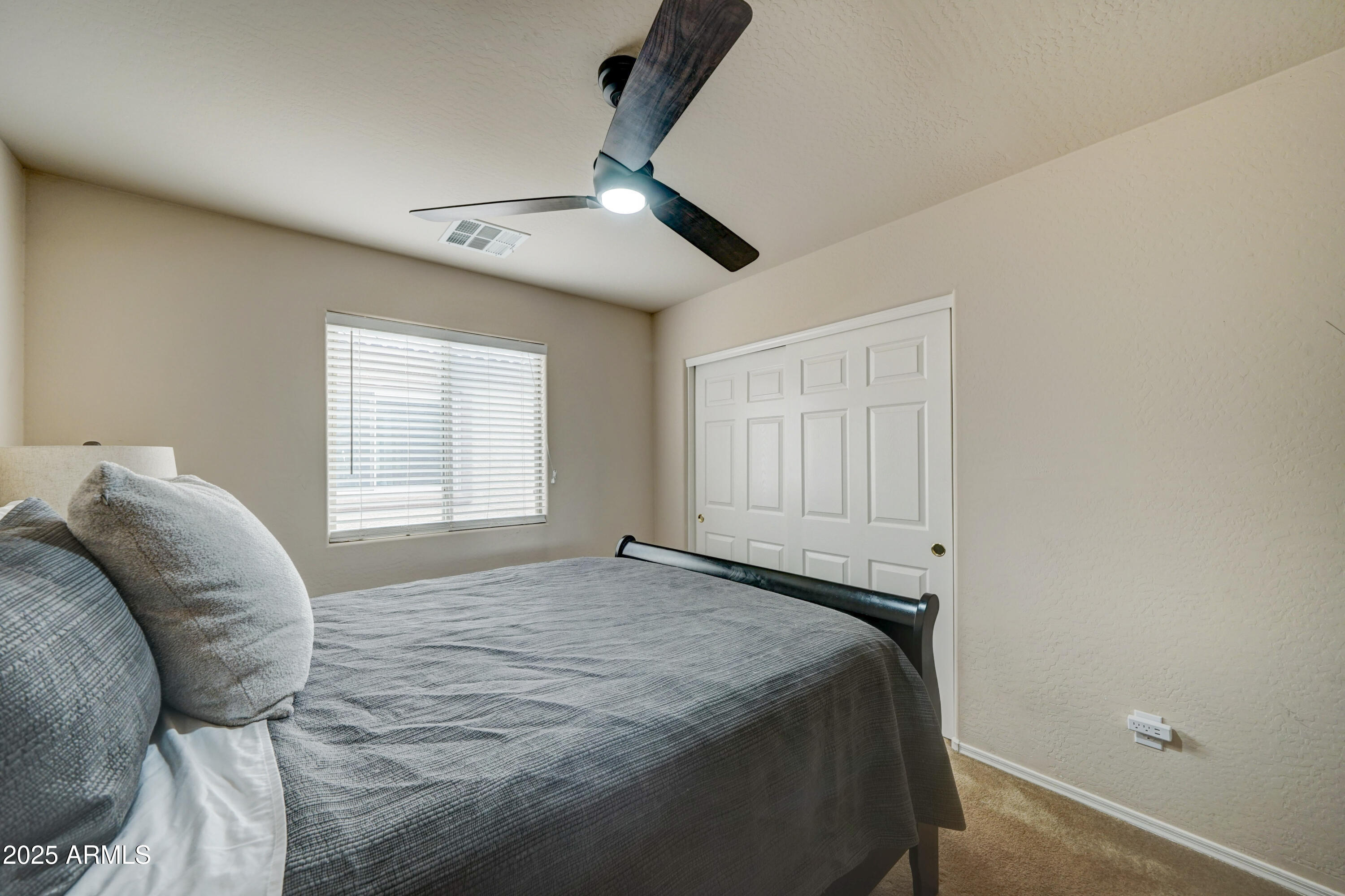 Undisclosed Address San Tan Valley, AZ 85143 - Photo 32 of 57 a bedroom with a bed and a window