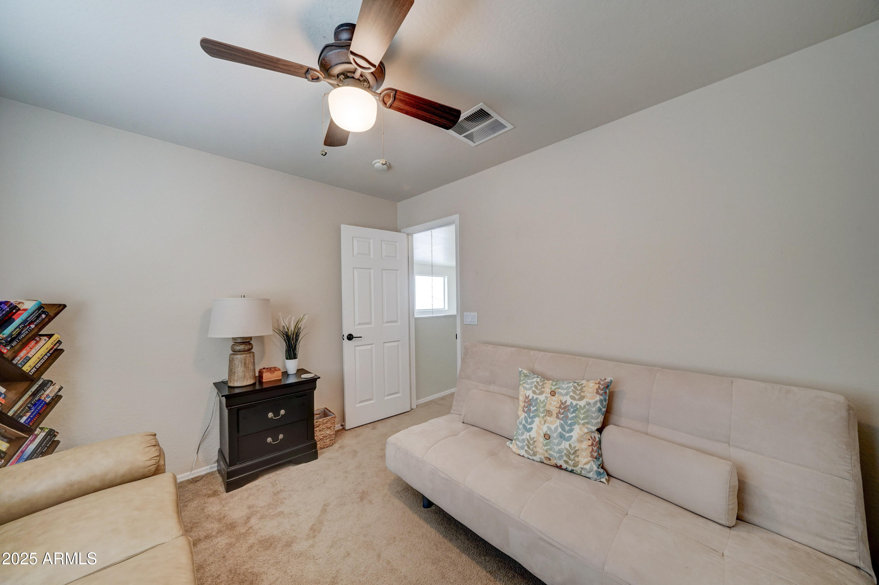 Undisclosed Address San Tan Valley, AZ 85143 - Photo 39 of 57 a living room with furniture and a ceiling fan
