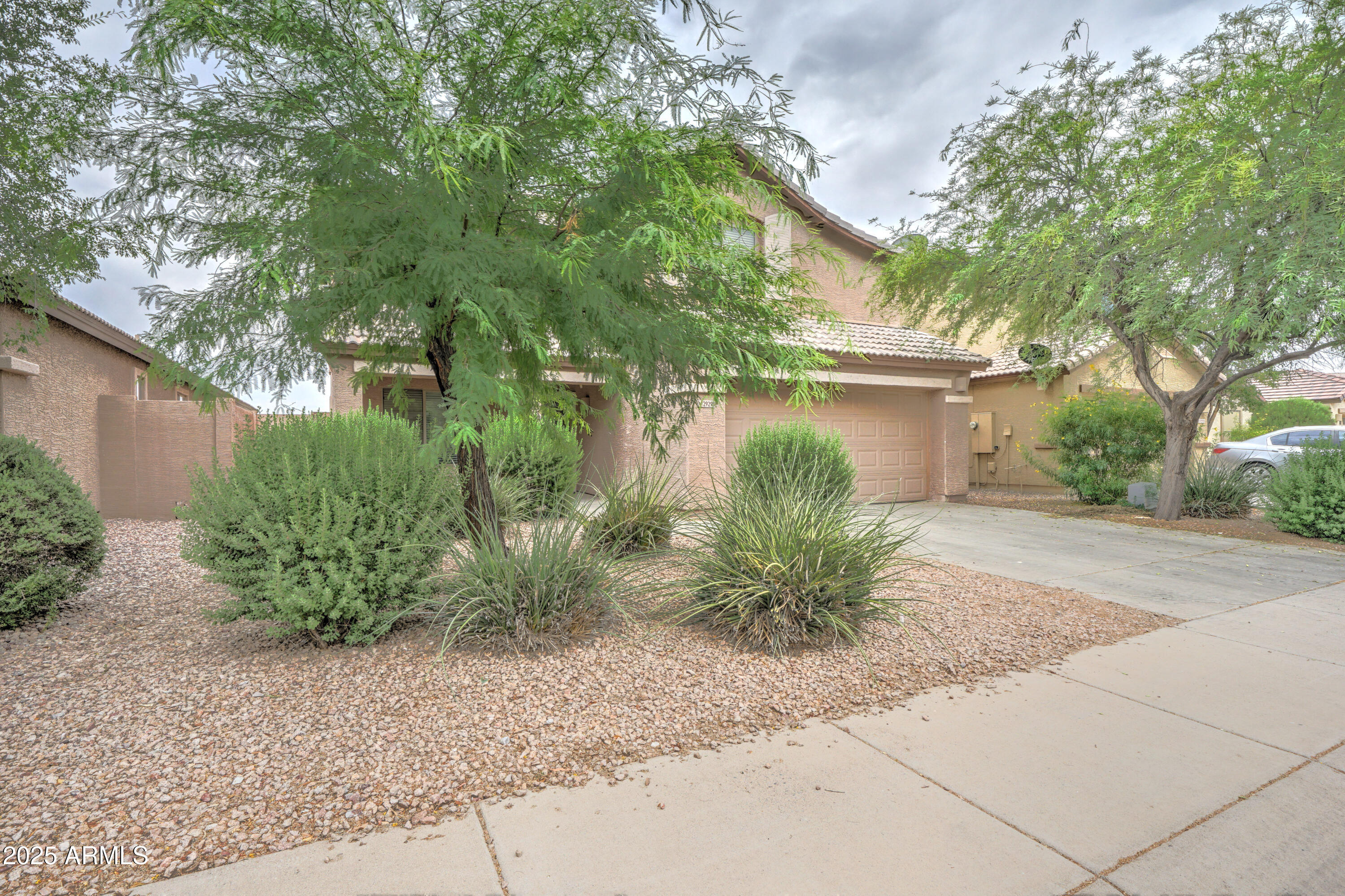 Undisclosed Address San Tan Valley, AZ 85143 - Photo 4 of 57 a view of a house with a street