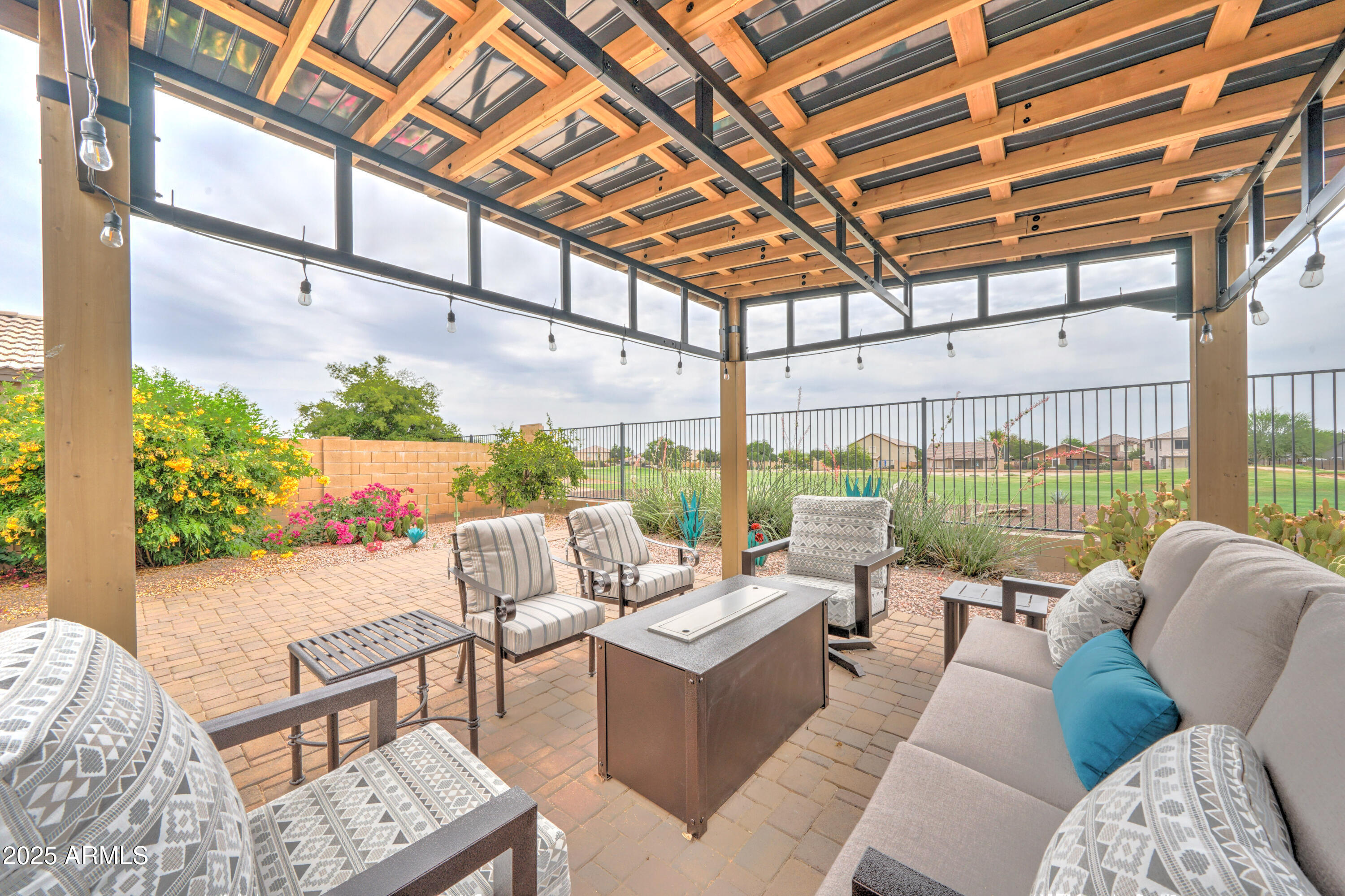Undisclosed Address San Tan Valley, AZ 85143 - Photo 43 of 57 a living room with patio furniture and a potted plants