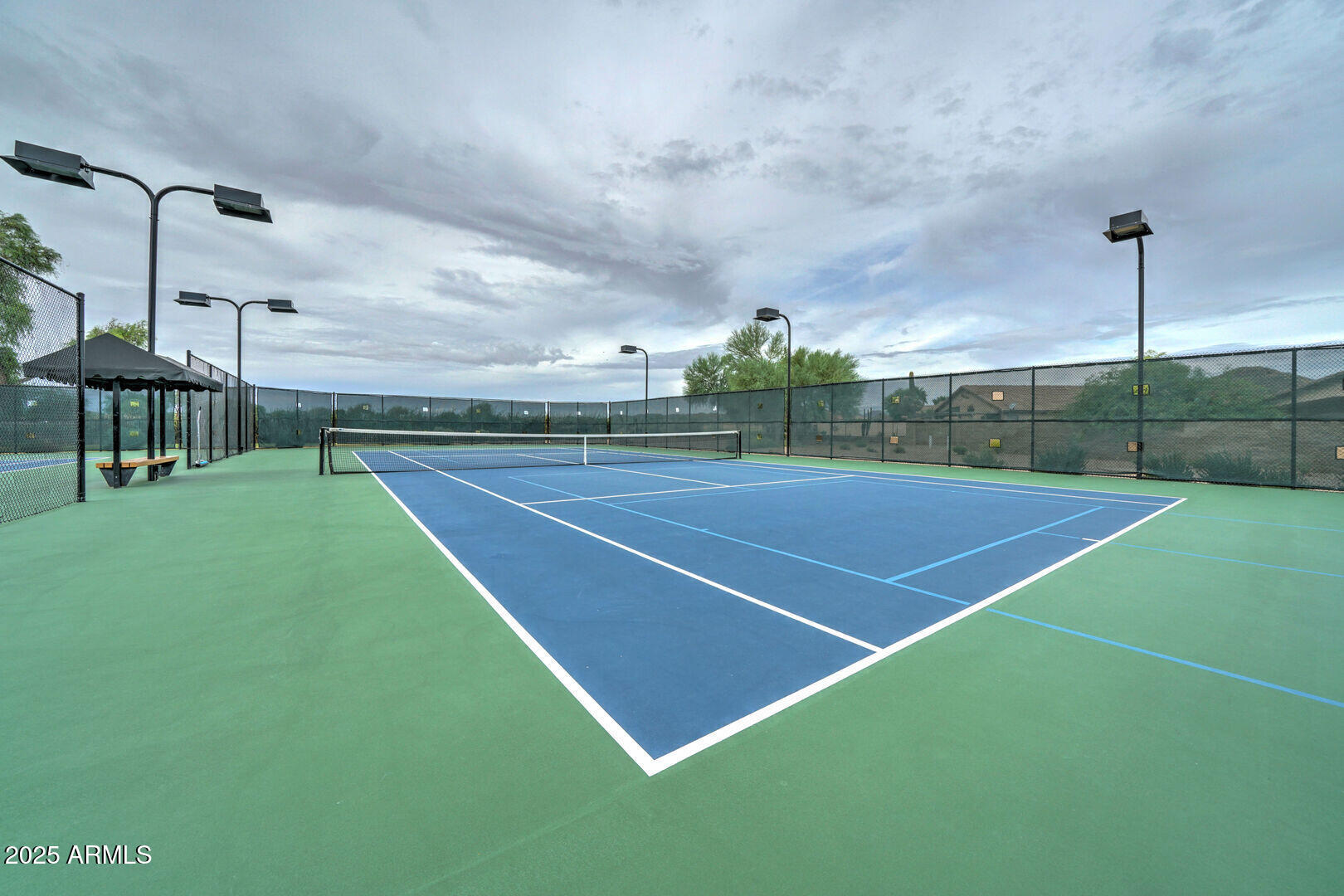 Undisclosed Address San Tan Valley, AZ 85143 - Photo 52 of 57 a view of an outdoor space and tennis court