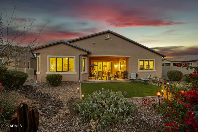 a living room with lots of furniture and lots of furniture