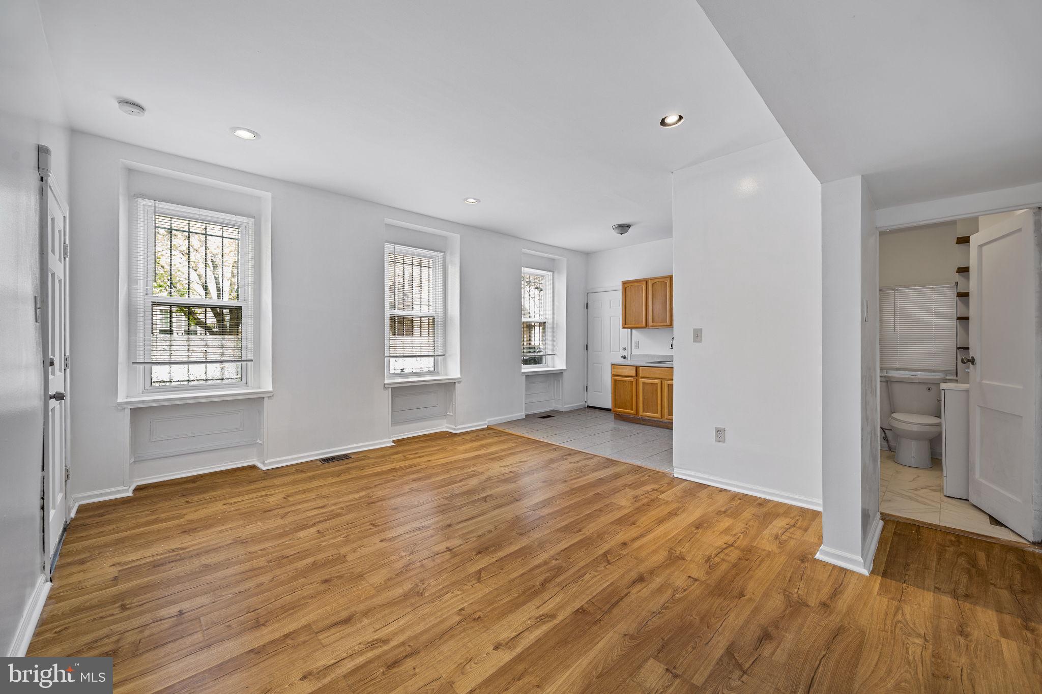 3800 Spring Garden Street Philadelphia, PA 19104 - Photo 18 of 35 a view of empty room with wooden floor and windows