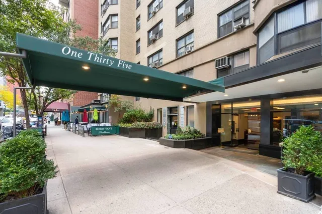 a view of a building with a patio