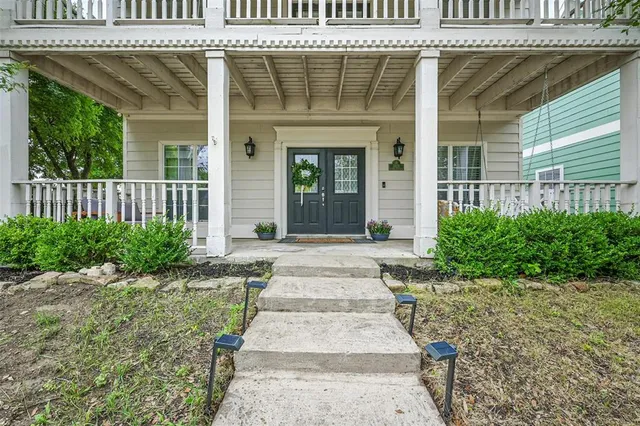 a front view of a house with a porch