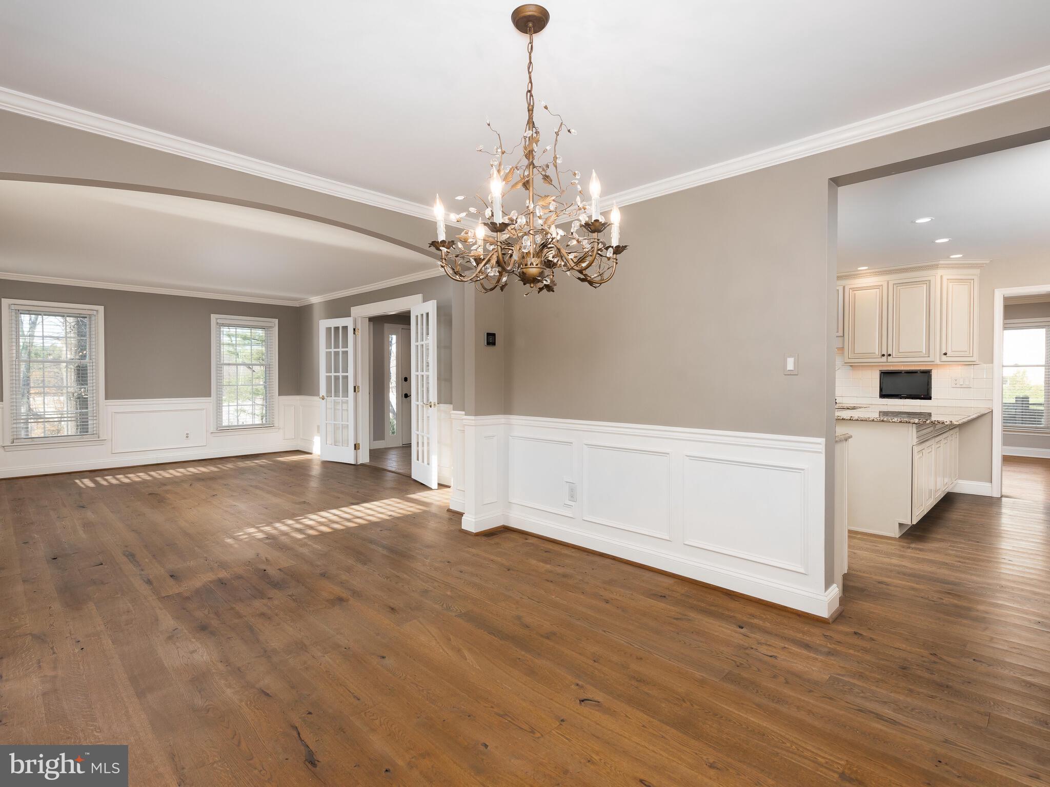 1780 Valley Greene Road Paoli, PA 19301 - Photo 11 of 45 Dining and living room accented with wainscoting