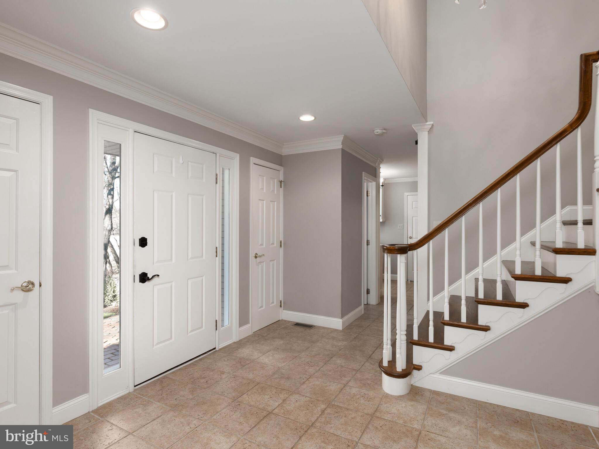 Flanking closets on either side of front door