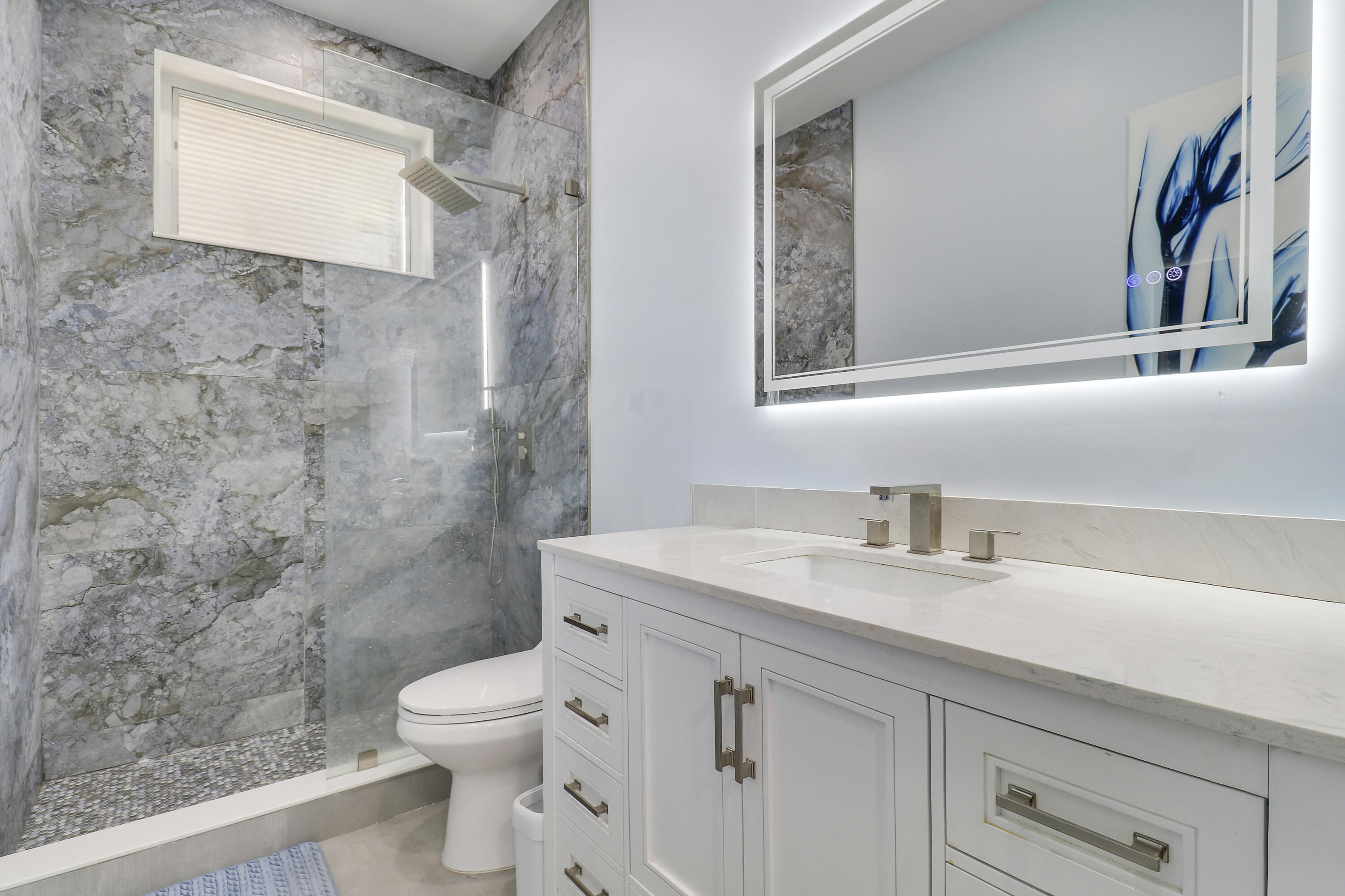 24 Douglas Drive Ocean Ridge, FL 33435 - Photo 12 of 19 Primary Bathroom