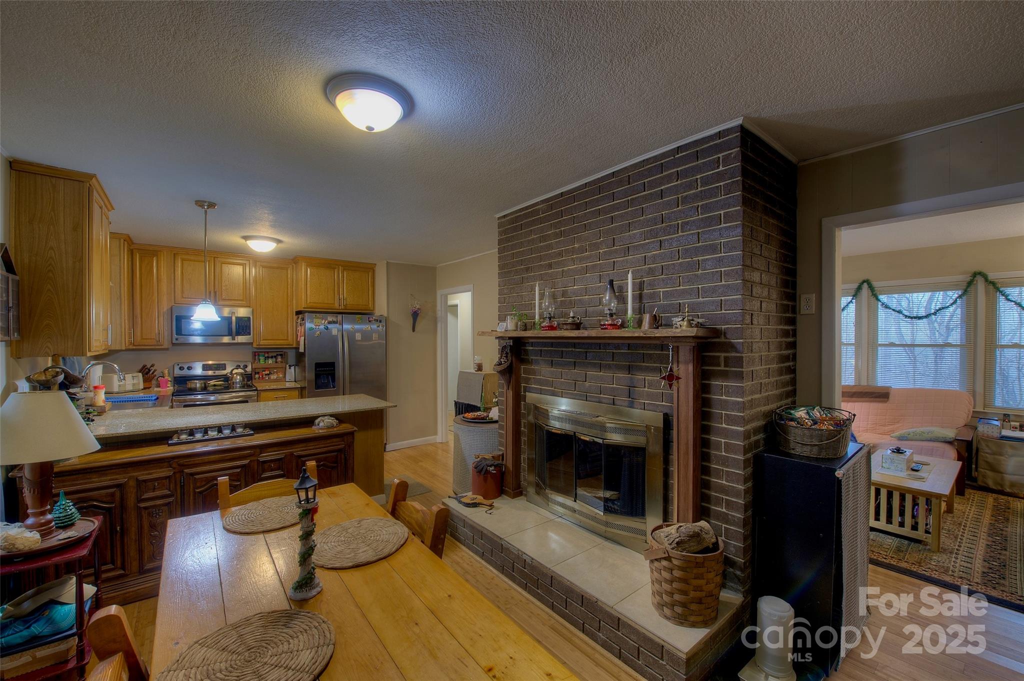 583 Deer Park Lake Road Spruce Pine, NC 28777 - Photo 4 of 24 a kitchen with sink refrigerator and stove