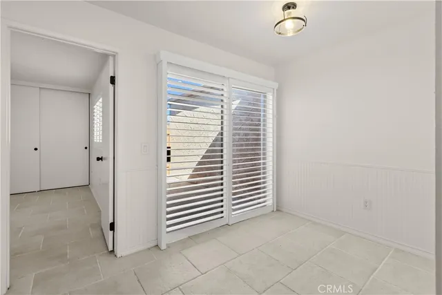 a view of a room that has a window in it