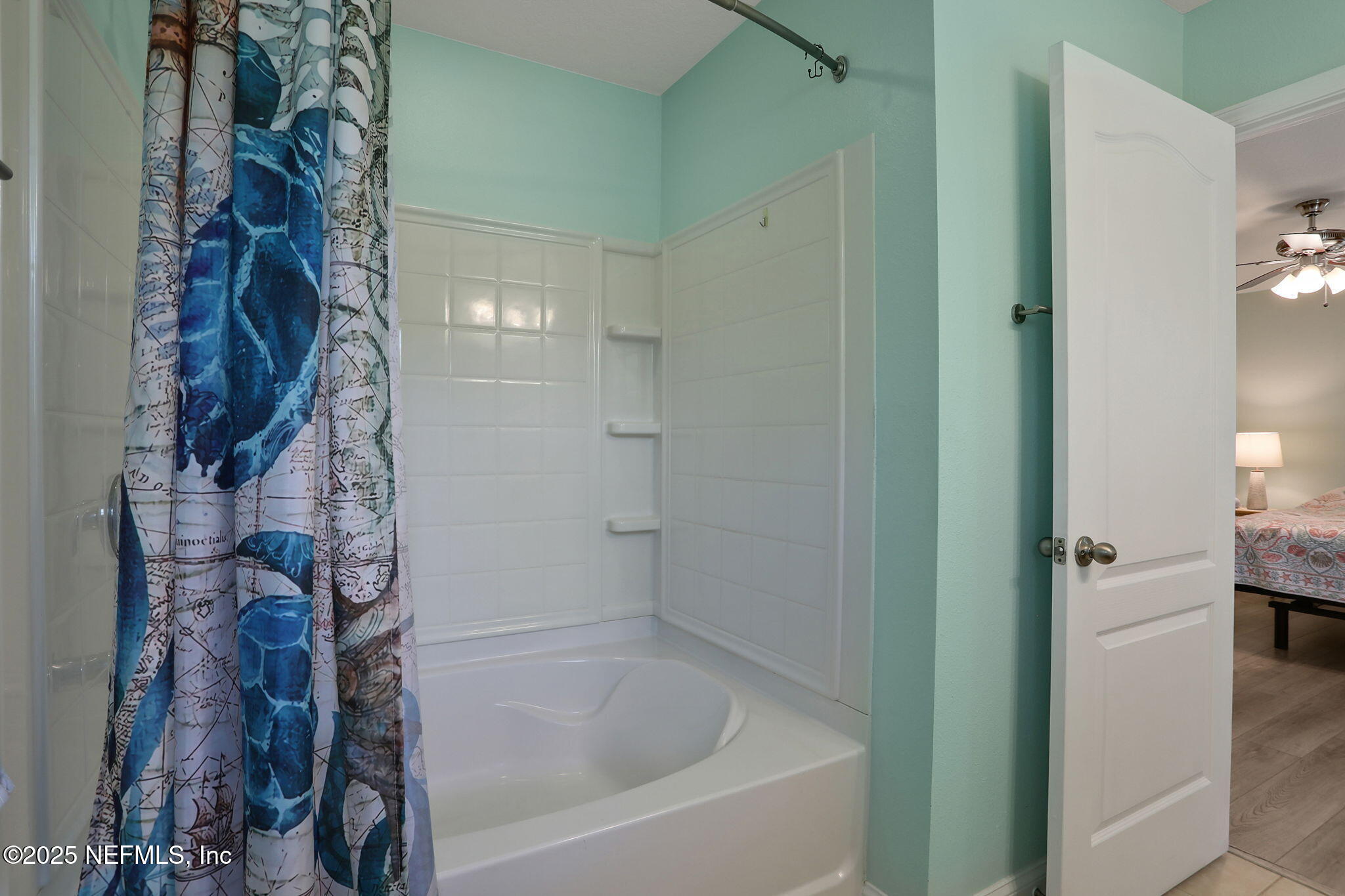 35 Root Lane St. Augustine, FL 32084 - Photo 18 of 37 a bathroom with a bathtub