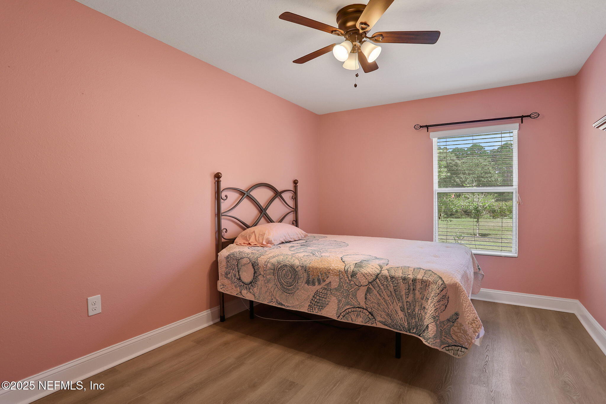 35 Root Lane St. Augustine, FL 32084 - Photo 25 of 37 a bedroom with a bed and a window