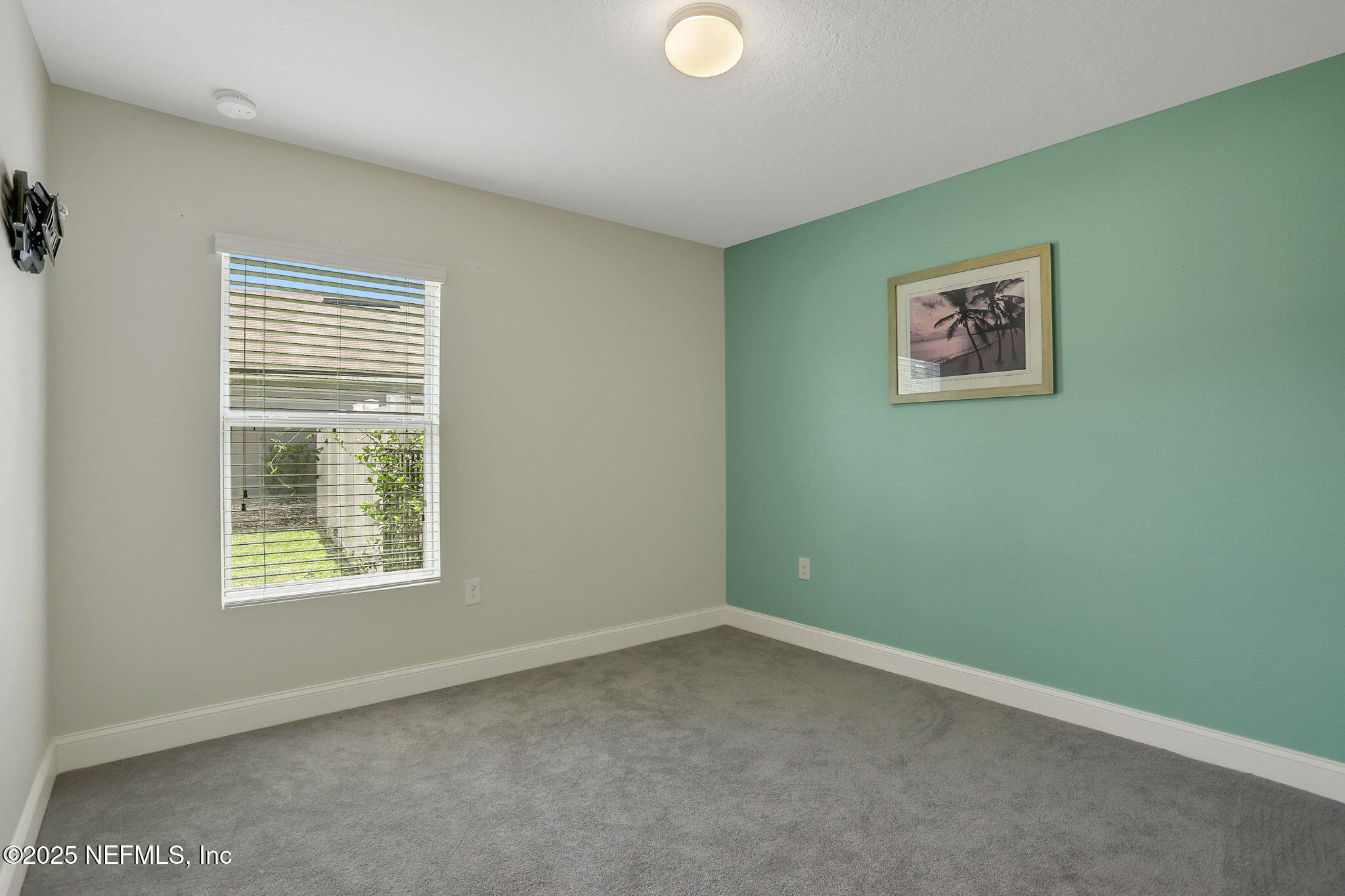 35 Root Lane St. Augustine, FL 32084 - Photo 27 of 37 an empty room with a window
